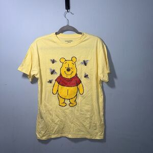 Disney’s Winnie The Pooh Women's Butter Yellow Cross Stitch Short Sleeve Tee SM